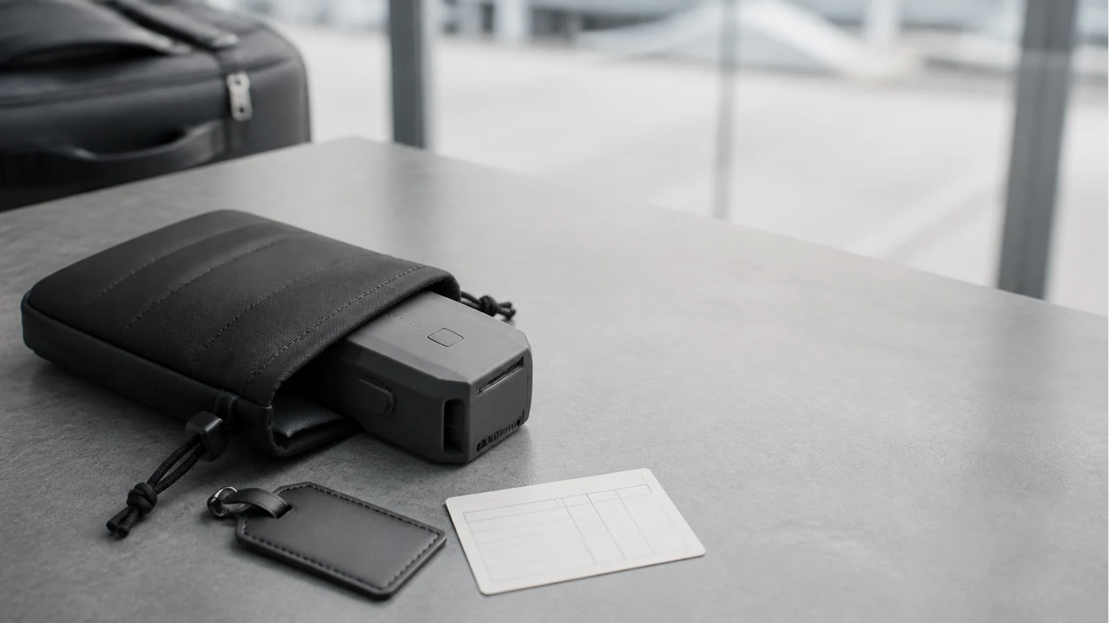 Packed lithium drone battery with a Wh calculation card for UK air travel checks